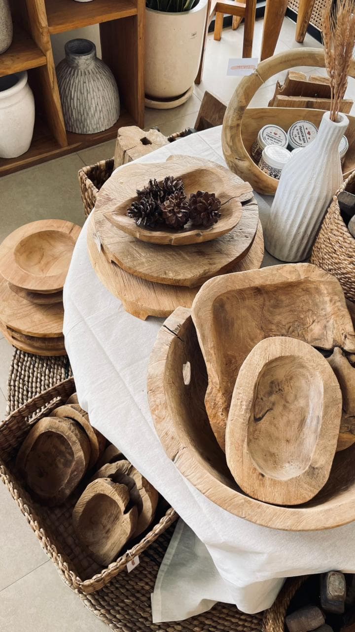 Repeatable stock at Tropis Canggu: cushion covers, wooden utensils, stone dispensers, baskets