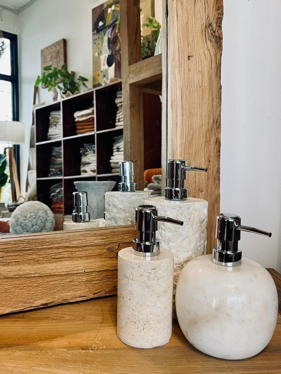 Stone dispensers and decor at Tropis Canggu, Bali